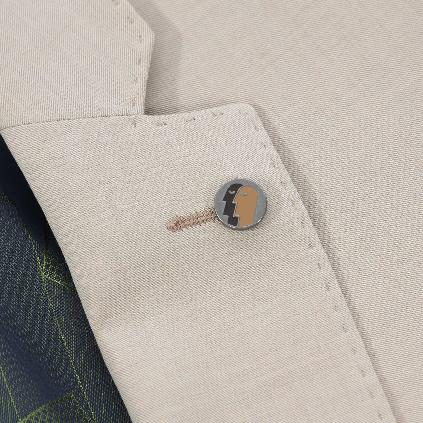 Remus Uomo Laurino Suit in Beige Lapel Badge