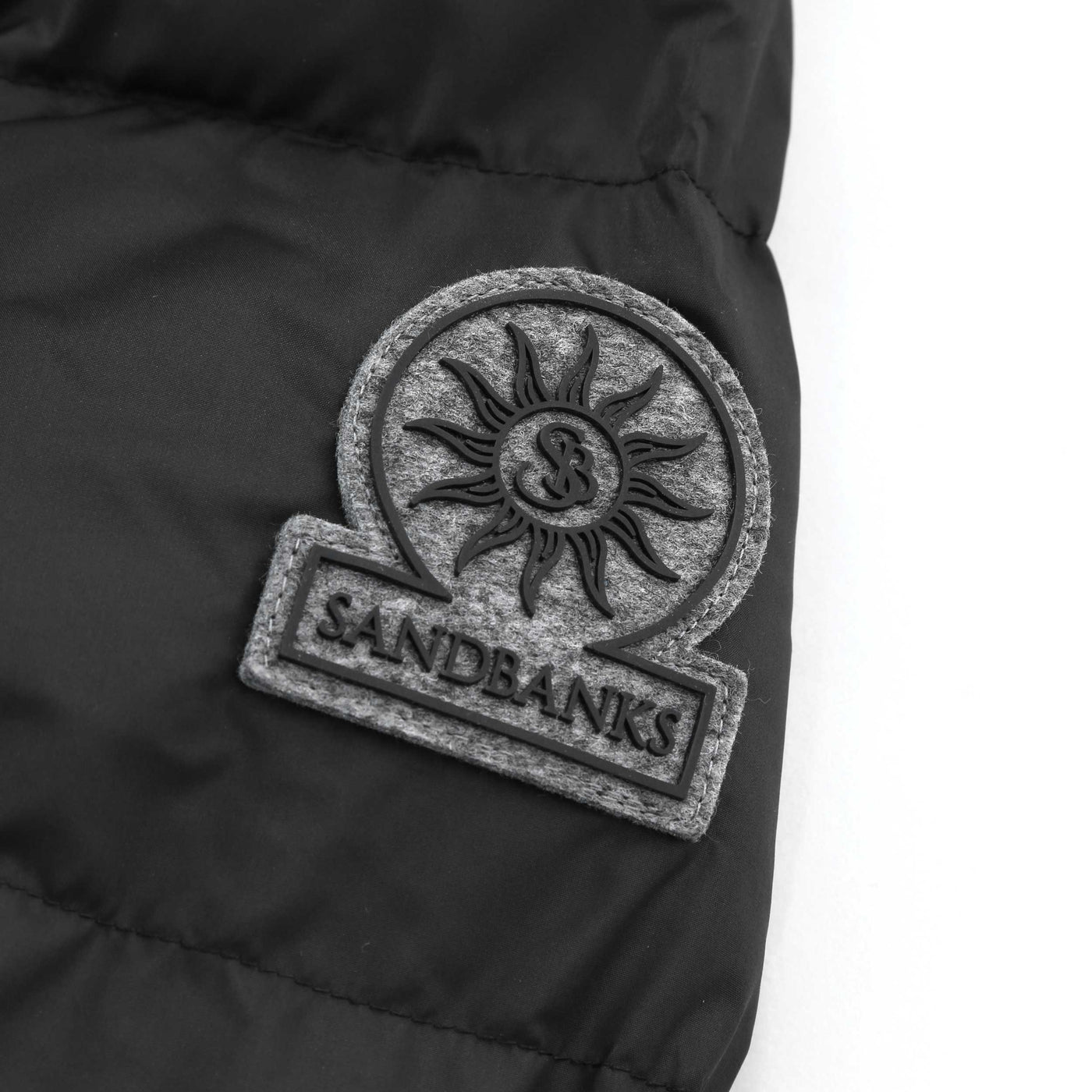 Sandbanks Apres Puffer Jacket in Black Logo