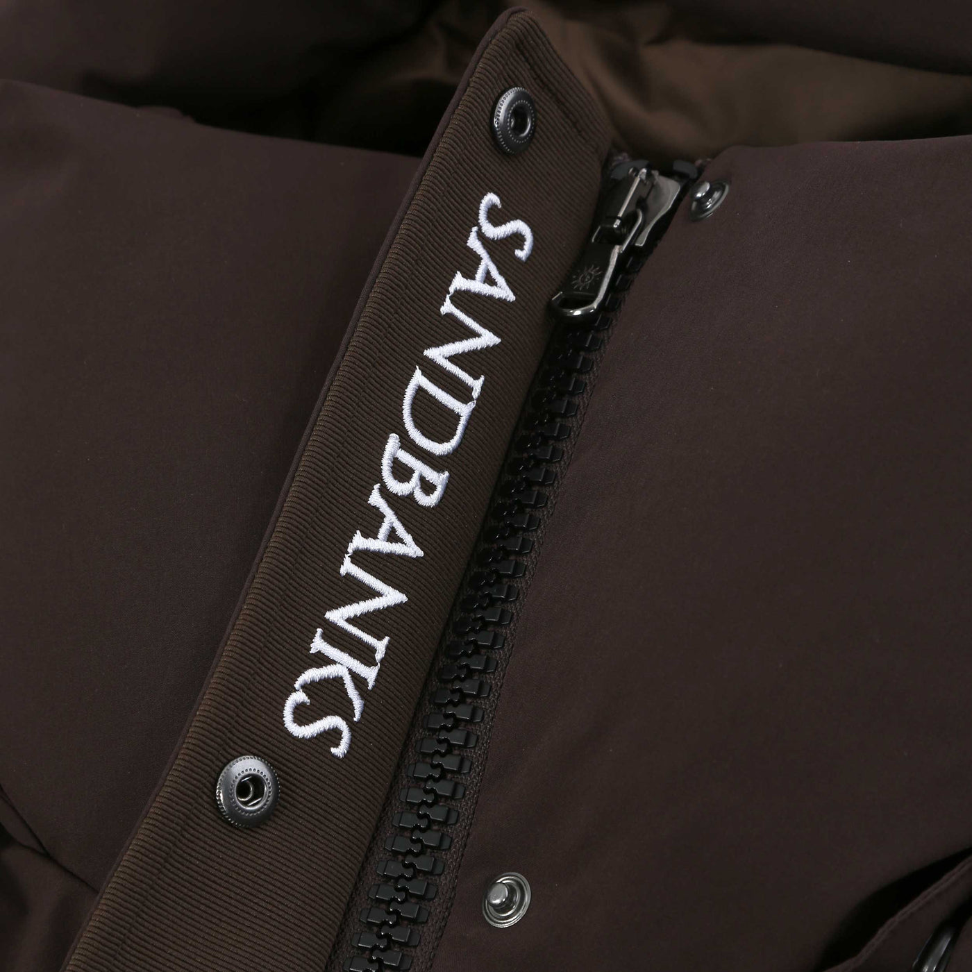 Sandbanks Haven Oversized Long Puffer Ladies Jacket in Brown Placket Logo